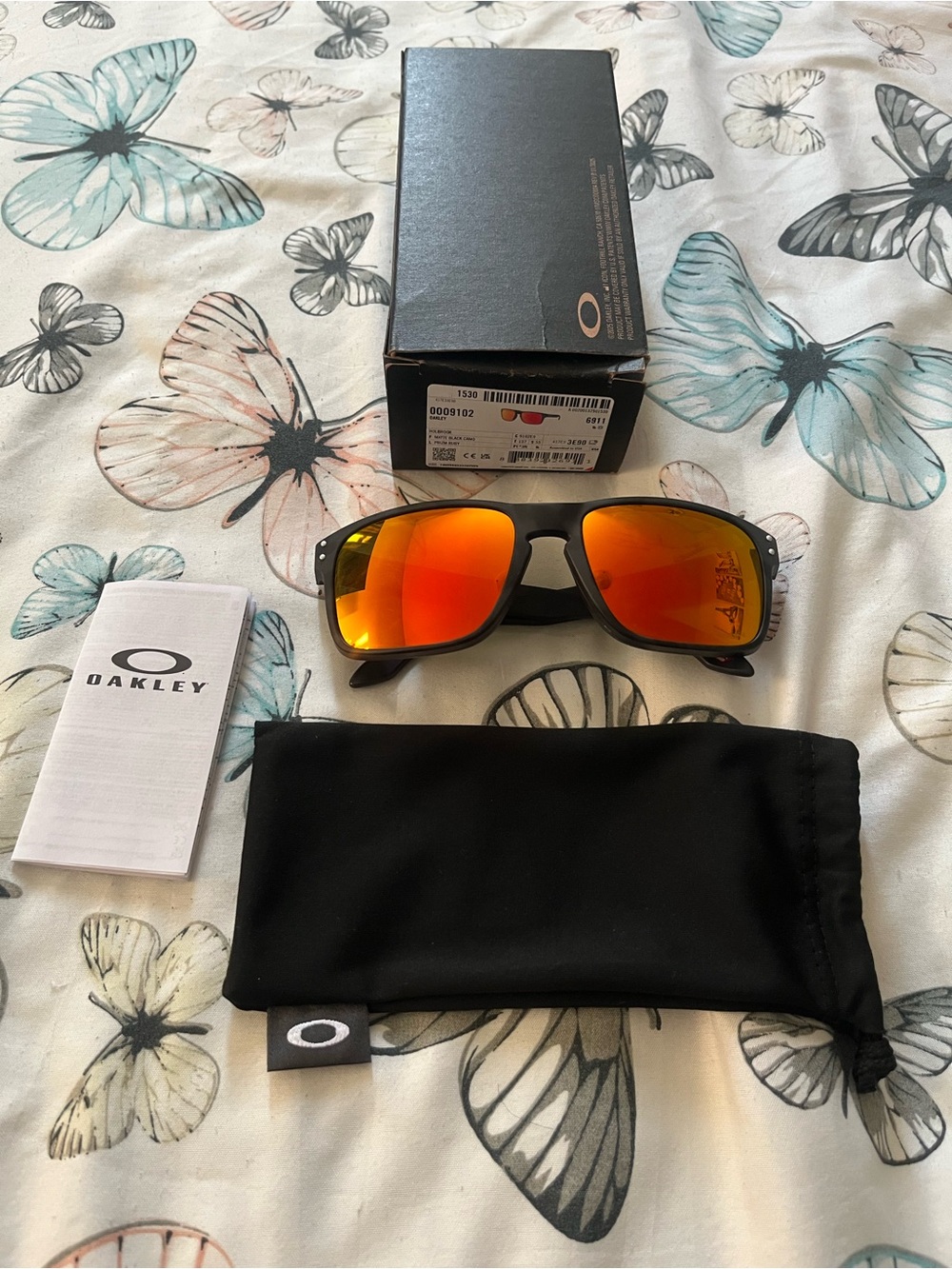 Oakley Sunglasses Black Frame with Red-Orange Mirrored Prizm Lenses